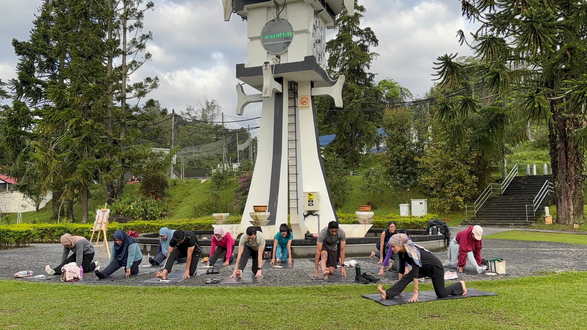Outdoor Pilates session at the Tanah Rata clock tower, Cameron Highlands